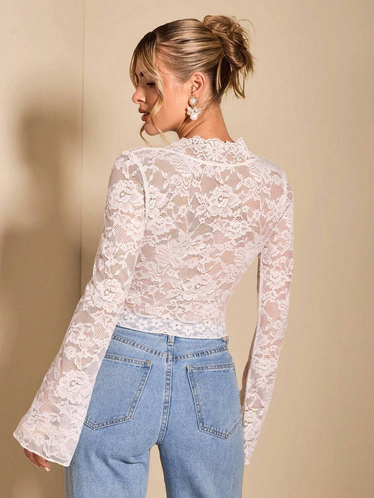 Isla Flare Lace Top | Black sheer party blouse