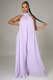 Isla Luxe Jumpsuit | Flowing backless halter jumpsuit