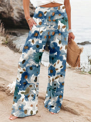 Noosa Bloom Pants | Relaxed floral wide-leg trousers