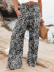 Noosa Bloom Pants | Relaxed floral wide-leg trousers