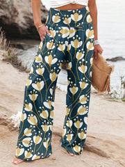 Noosa Bloom Pants | Relaxed floral wide-leg trousers