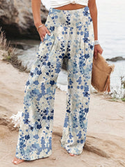 Noosa Bloom Pants | Relaxed floral wide-leg trousers