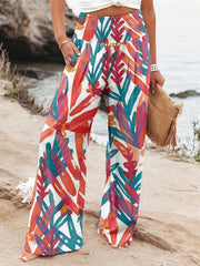 Noosa Bloom Pants | Relaxed floral wide-leg trousers