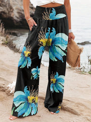 Noosa Bloom Pants | Relaxed floral wide-leg trousers